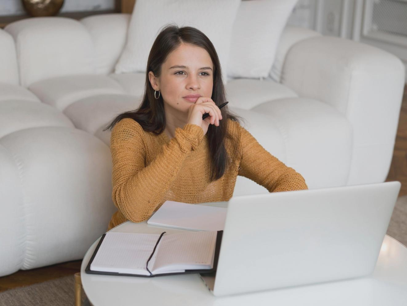 Business owner reviewing financial reports and planning documents
